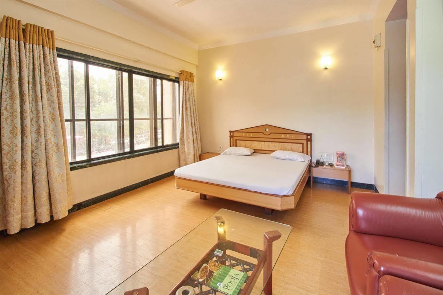 Hotel Pooja International Nashik Esterno foto